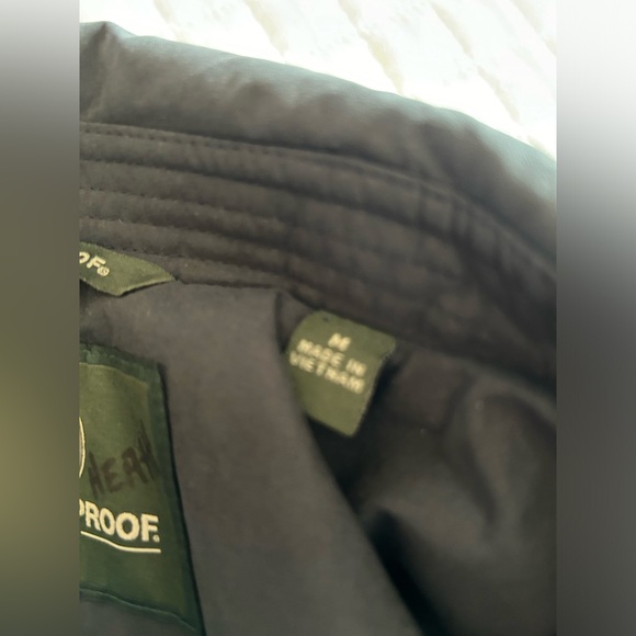 WP100 Men’s black golf jacket. Snap pockets weatherproof - Picture 5 of 5